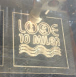 Laser cutting race logo in perspex as the first step in making a cast glass trophy