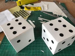 home made dice showing a double 6