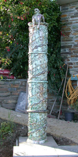 Ceramic column, inspired by Trajan's Column in Rome and an Escher drawing of people climbing steps.