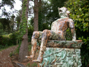 A model of a man laughing, at the top of the column by Peter Heywood