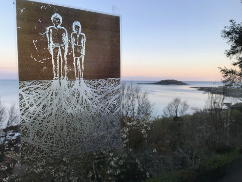 Couple putting down roots, printed on acetate, stuck to window