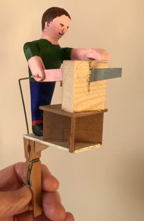 Sawing man clothes peg automaton