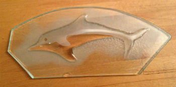 Glass dolphin made by Peter Heywood for Devonport Gate