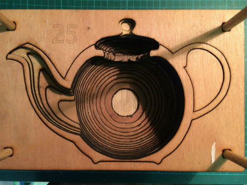 Teapot and its outside, in plywood